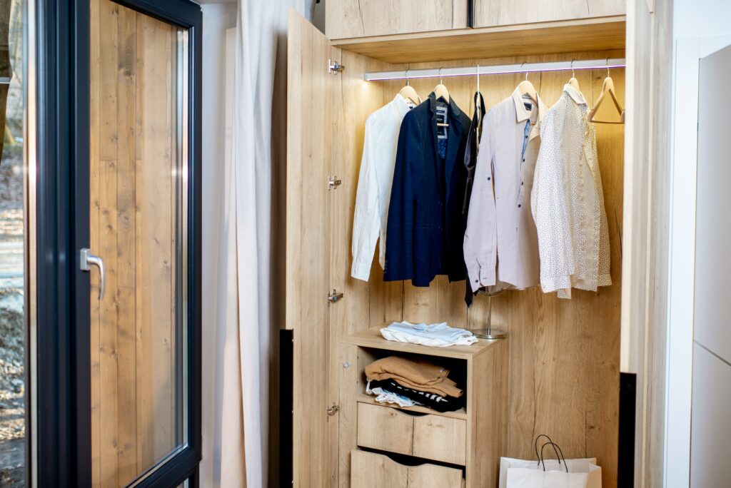 Wardrobe with male clothes at home